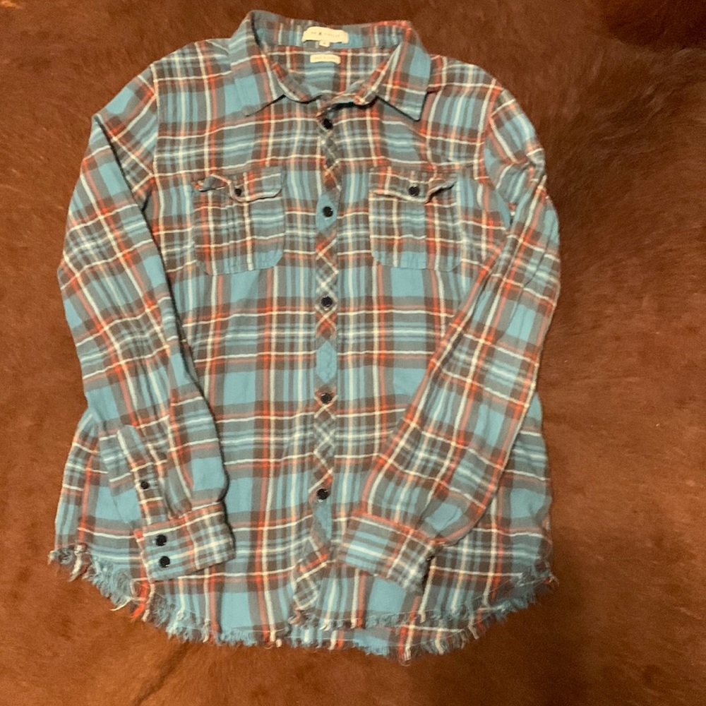 Women’s plaid and Aztec button down. Size M. Unique shirt, super soft.